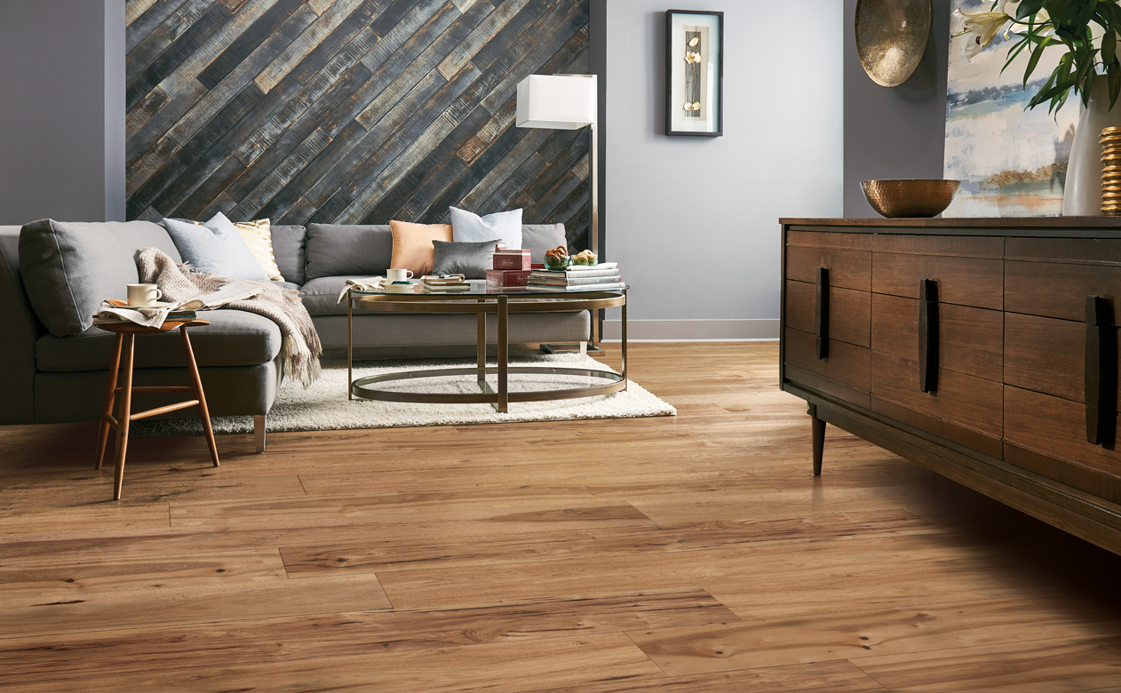 Wide plank hardwood living room with grey wall planks 
