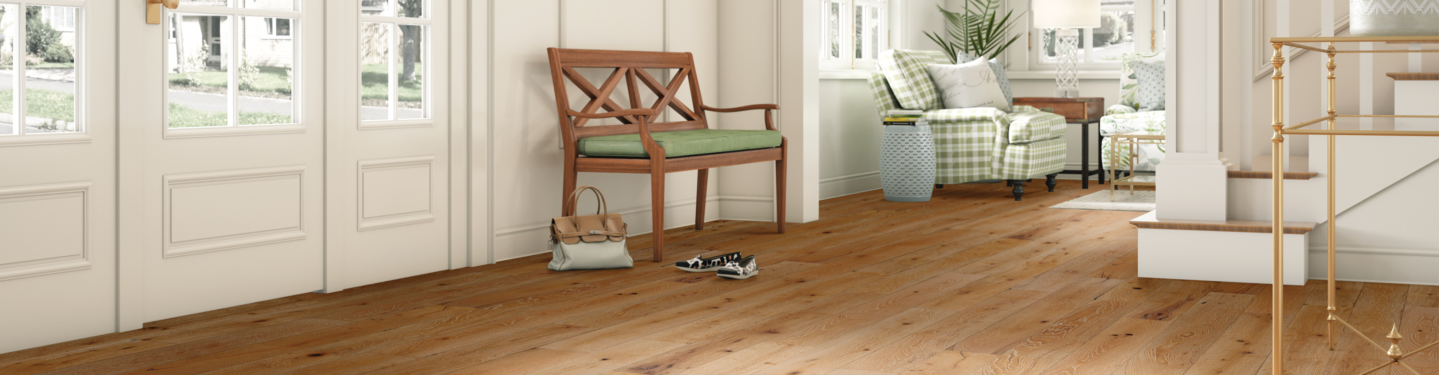 Oak hardwood floor in entryway with green cushion bench and stairs 